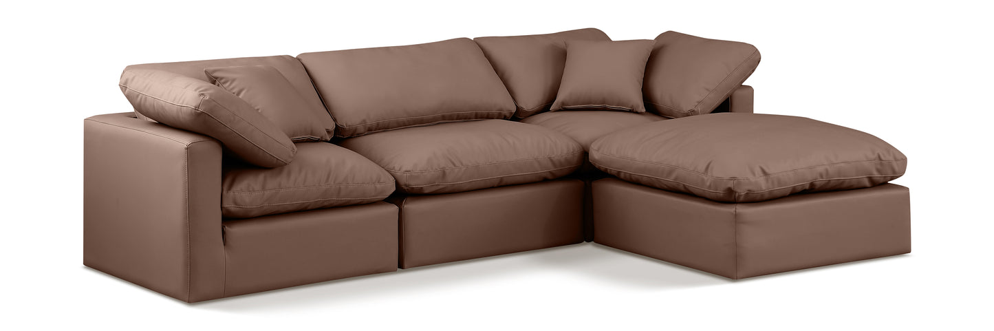 Indulge 105" Vegan Leather Upholstered 4pc. Modular Sectional